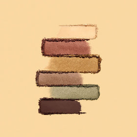 bareMinerals swatch series on forearm demonstrating buildable color and shade range