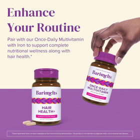 BariMelts bottle on bathroom shelf in routine setting suggesting daily hair care support
