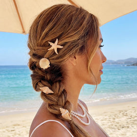 BARTOSI clips styled with beach outfit illustrating travel-ready coastal charm