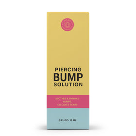 BASE LABORATORIES applied to ear piercing illustrating calming of bumps benefit