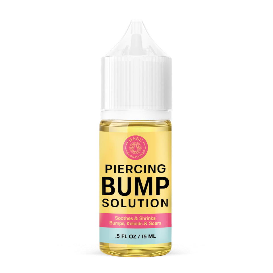 BASE LABORATORIES front bottle shot showing soothing aftercare oil benefit