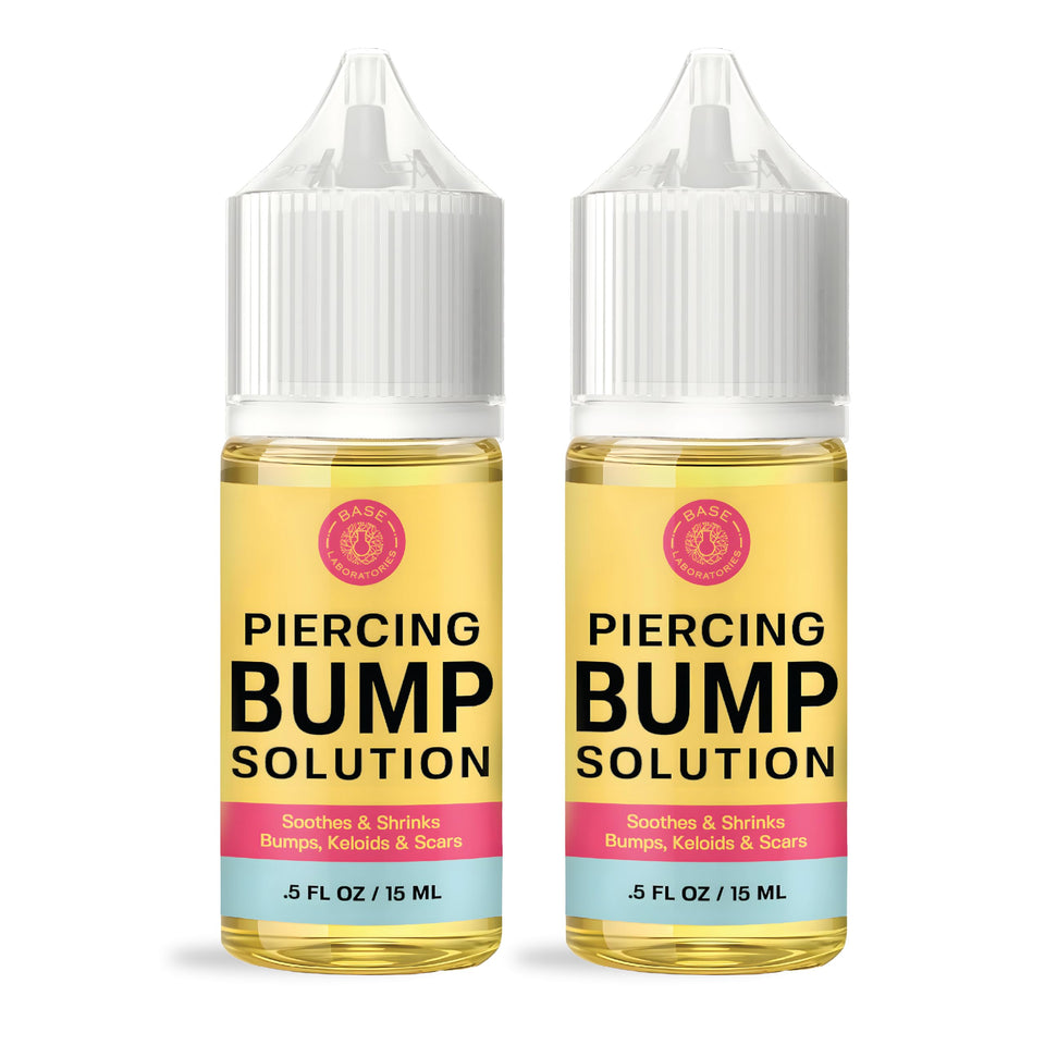 BASE LABORATORIES front packaging showing clean aftercare oil for piercings and calm skin
