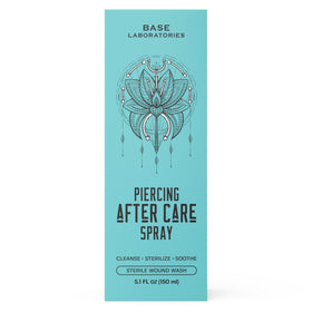 BASE LABORATORIES aftercare setup on bathroom counter, organized routine for healing piercings