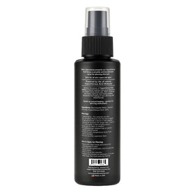 BASE LABORATORIES travel-friendly bottle next to keys to show portability and convenience