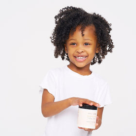 BASK & LATHER applied in curly hair during styling for defined bounce and reduced frizz