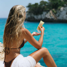 Bask sunscreen being applied to hand demonstrating sheer absorption benefit