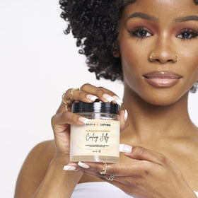 BASK & LATHER application in curly hair demonstrating defined frizz-free coils