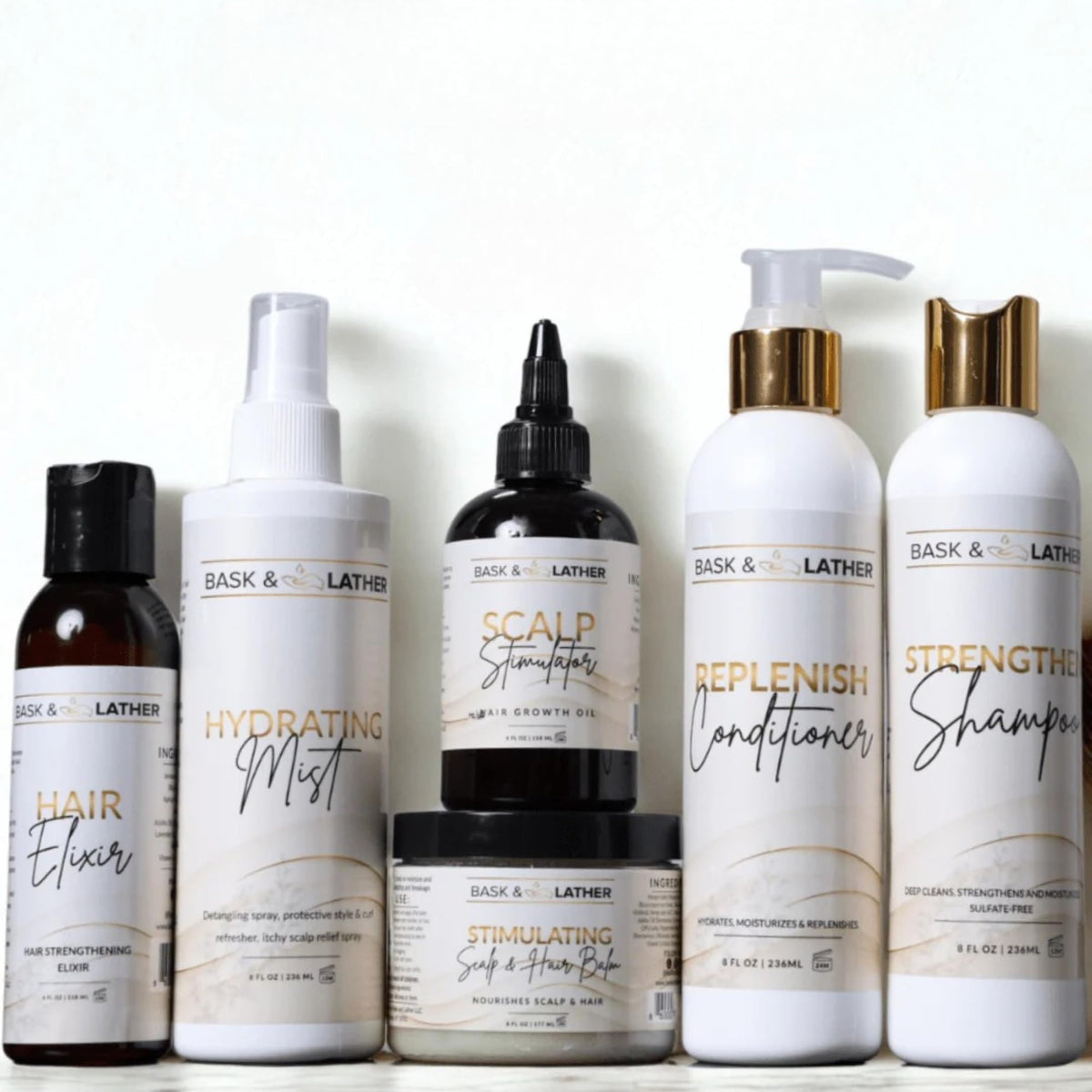 Bask & Lather starter kit front view showing six-piece set for complete scalp and hydration routine