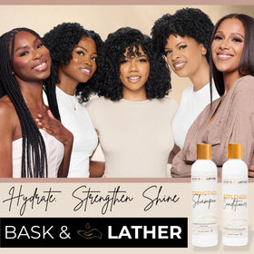 BASK & LATHER bottle in shower being used to cleanse and strengthen hair