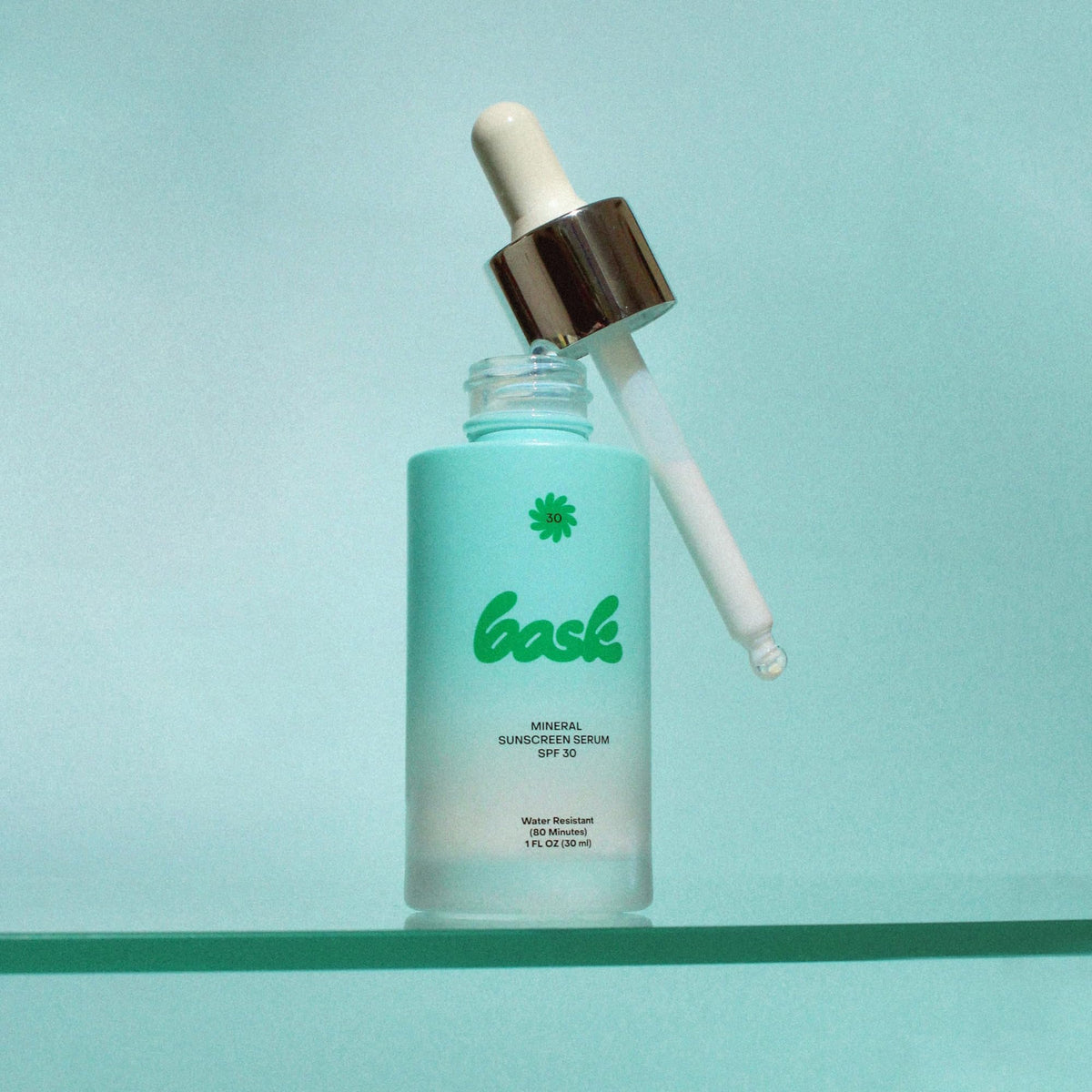 Bask pump dispensing serum illustrating easy, controlled application benefit