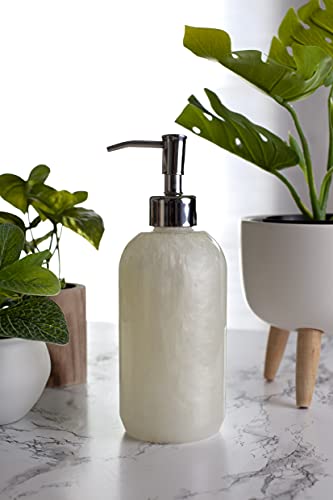Bastion Finesilk jug refilling a dispenser in a commercial restroom for savings
