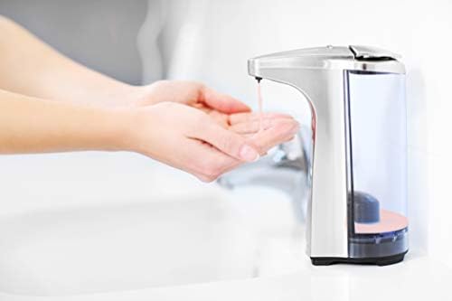 Creamy peach-scented lather in hand with Bastion bottle, shows moisturizing and rich foam