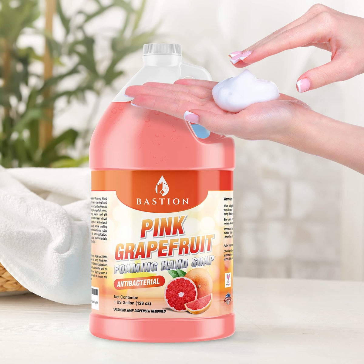 Bastion pouring refill into foaming dispenser illustrating easy, mess-free refill