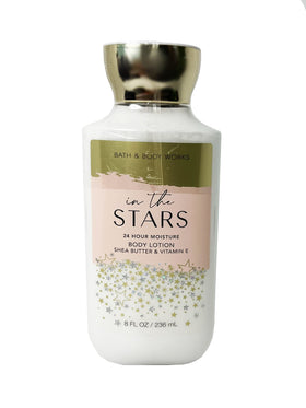 Bath & Body Works next to ruler showing 8 fl oz scale and travel-ready size