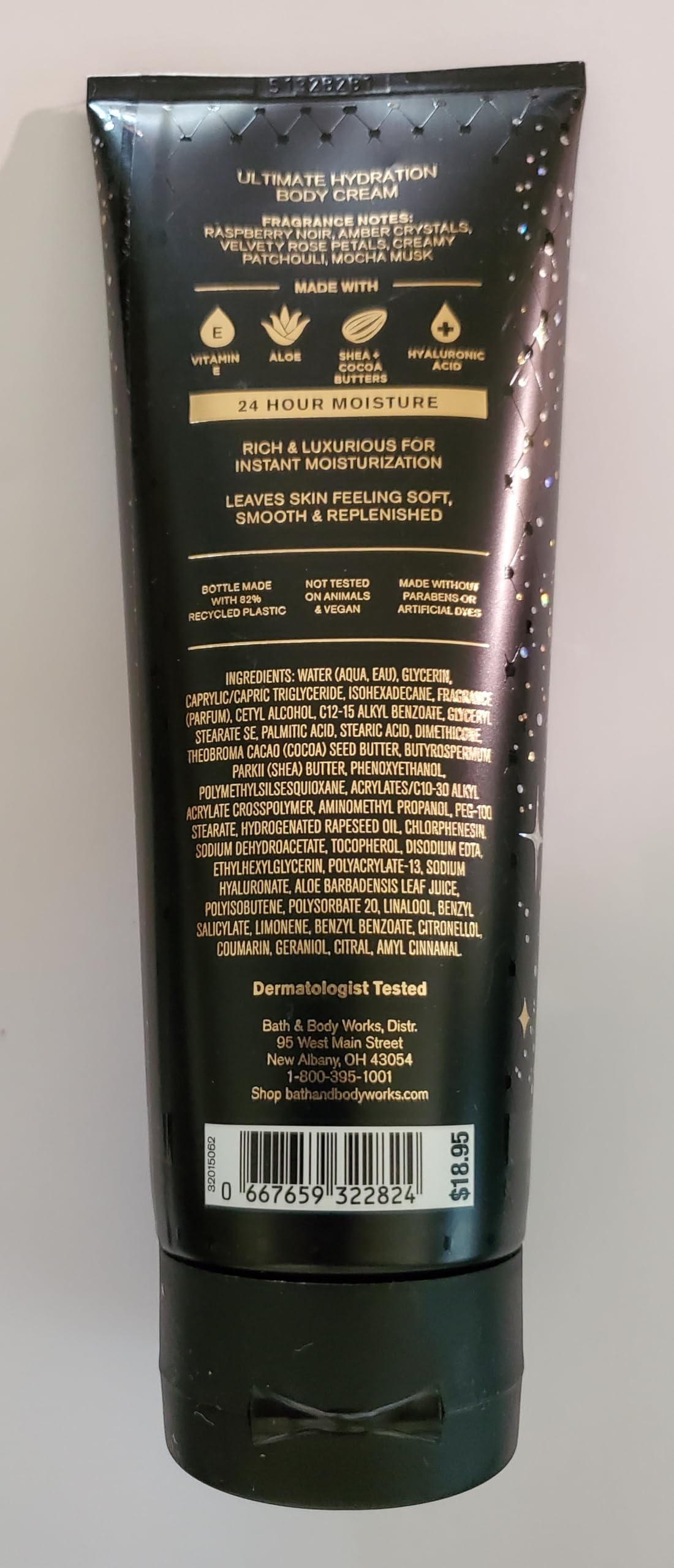 Bath & Body Works tub beside bedside lamp, suggests nightly moisturizing routine benefit