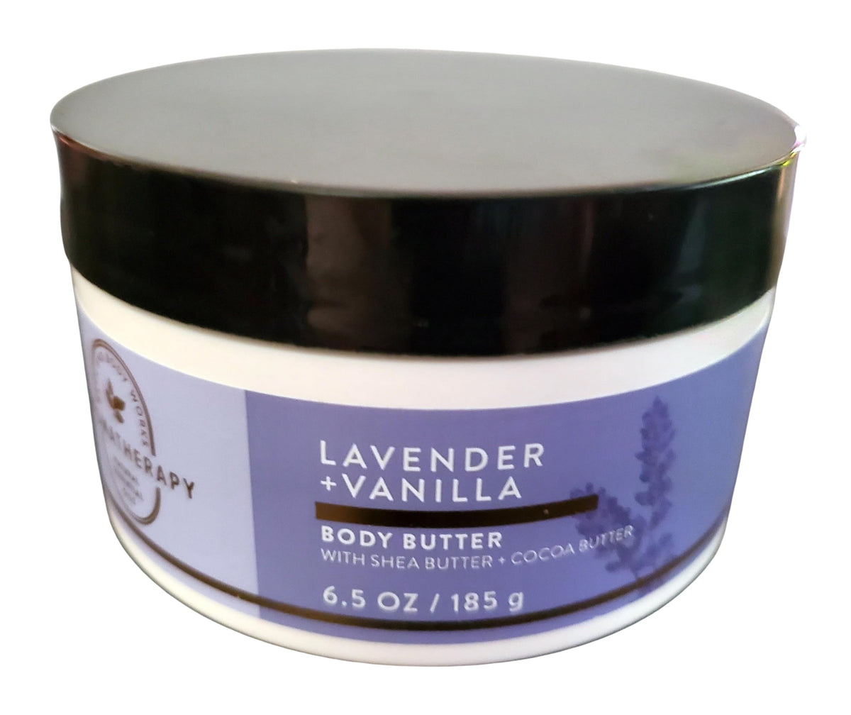Bath & Body Works jar on nightstand with candle conveying relaxing lavender-vanilla bedtime ritual