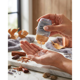 Bath & Body Works bottle with open cap showing flip-top design for leak prevention and convenience