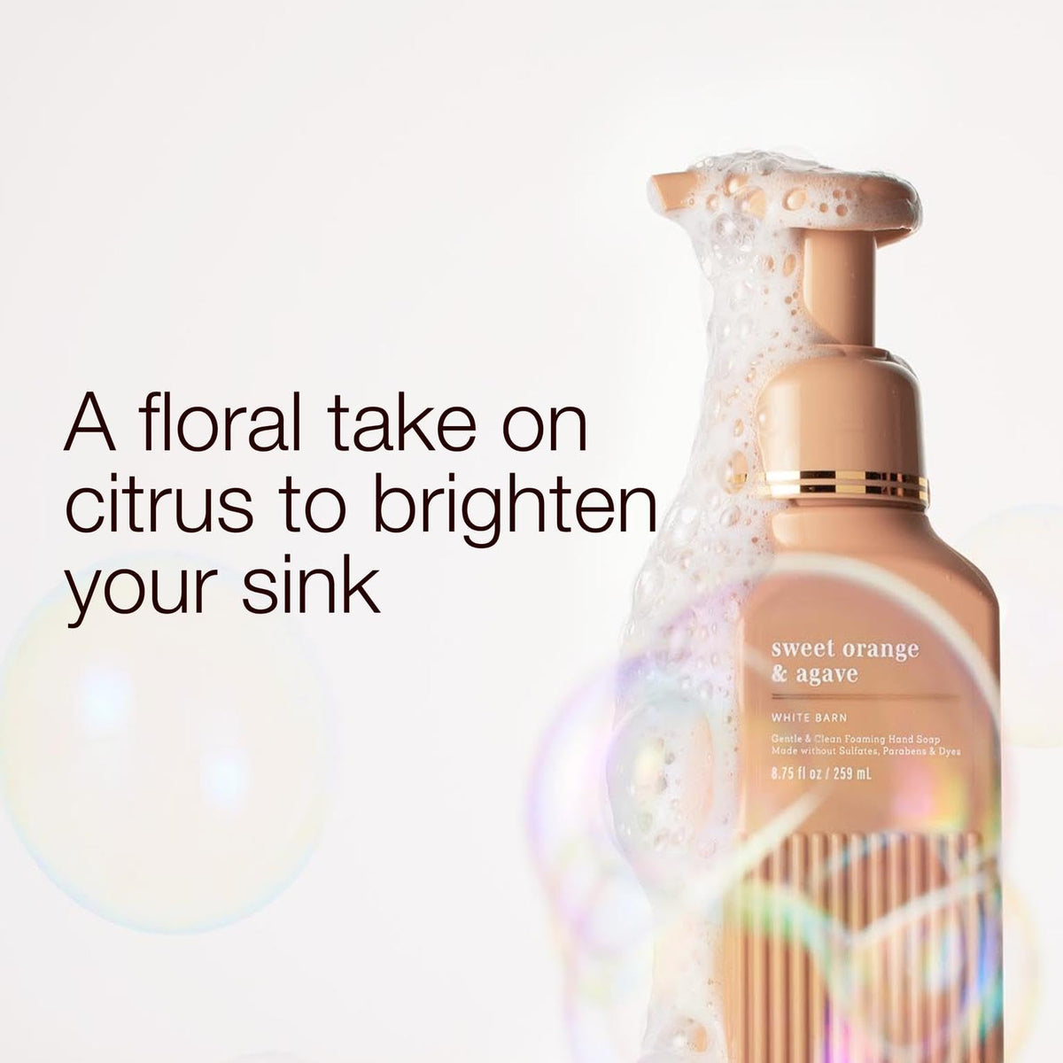 Bath & Body Works label close-up showing Sweet Orange & Agave Citrus fragrance and benefits