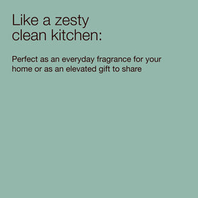 Bath & Body Works bottle on kitchen counter in bright setting, conveys fresh citrus ambiance