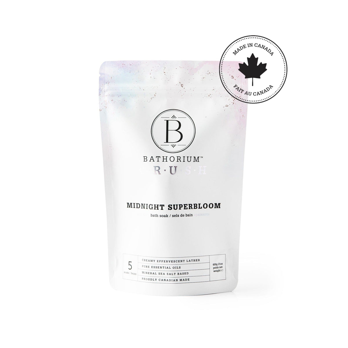 Bathorium pouring violet bath soak into hand showing texture and ease of use