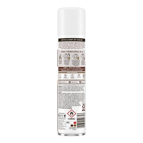 batiste applying to roots to boost volume and reduce oil