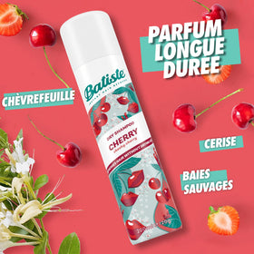 Batiste being sprayed at roots to remove oil and add volume