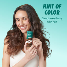 Batiste powder swatched on hand showing blendable texture and coverage