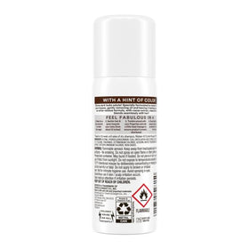 Batiste dark held in hand demonstrating compact travel-friendly size