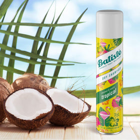 Lifestyle image with model on beach using Batiste for fresh scent