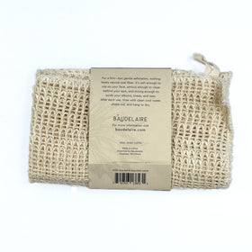 Baudelaire washcloth in shower being used to cleanse, showing effective yet gentle benefit