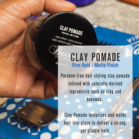 Baxter of California Clay Pomade open jar close-up revealing clay texture for easy texturizing