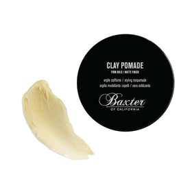 Travel shelf with Baxter of California Clay Pomade 2 oz showing compact size for grooming on the go