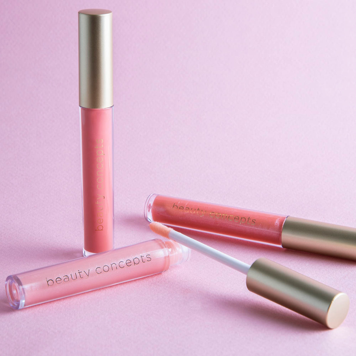 B.C BEAUTY CONCEPTS gloss tube close-up highlighting applicator and smooth, glossy finish