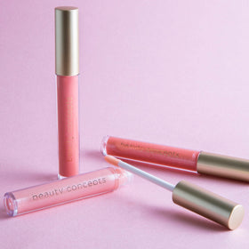 B.C BEAUTY CONCEPTS gloss tube close-up highlighting applicator and smooth, glossy finish
