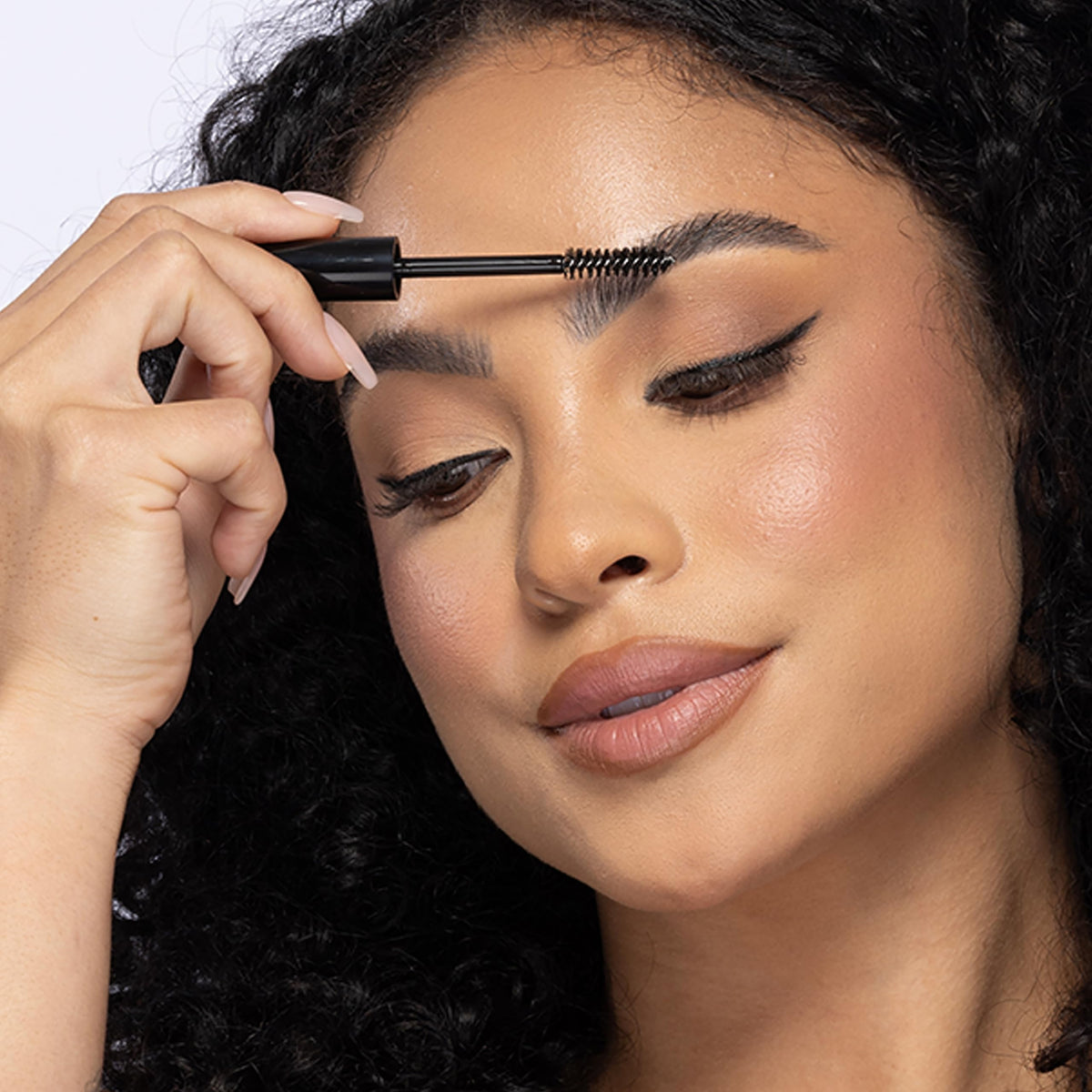billion dollar brows gel on brow demo showing groomed hairs and smudge-resistant benefit