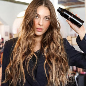 Beachwaver spray nozzle close-up demonstrating fine mist for controlled texture