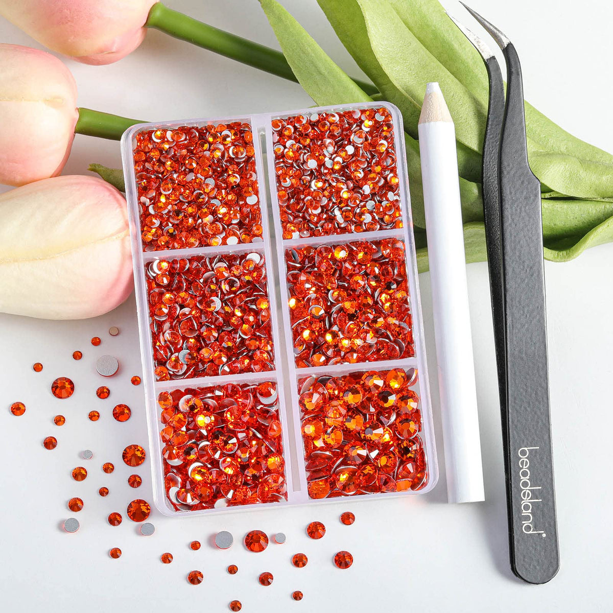 BEADSLAND close-up of facet cuts on orange glass rhinestone, highlighting bright sparkle benefit