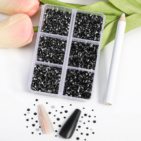 BEADSLAND close-up of faceted black rhinestones showing reflective detail