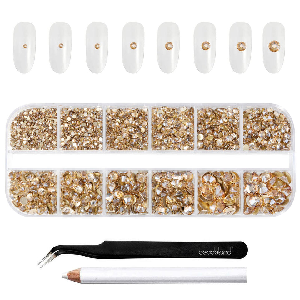 BEADSLAND front packaging showing labeled gold rhinestone compartments and tools