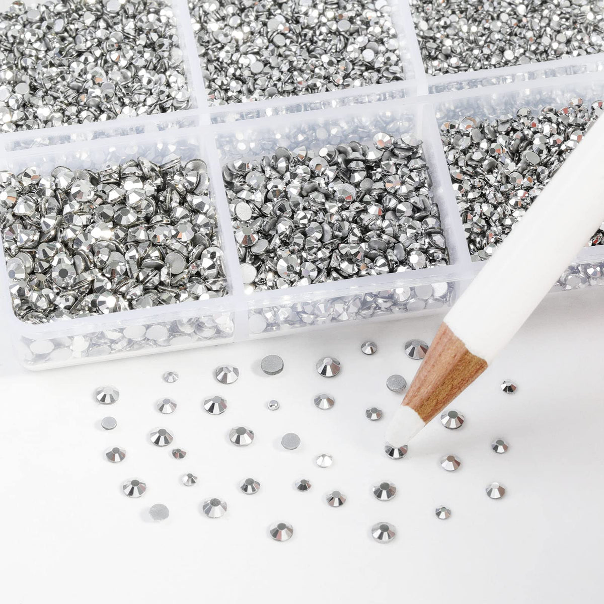 BEADSLAND rhinestones in hand to show mixed SS3-SS10 size scale and handling ease