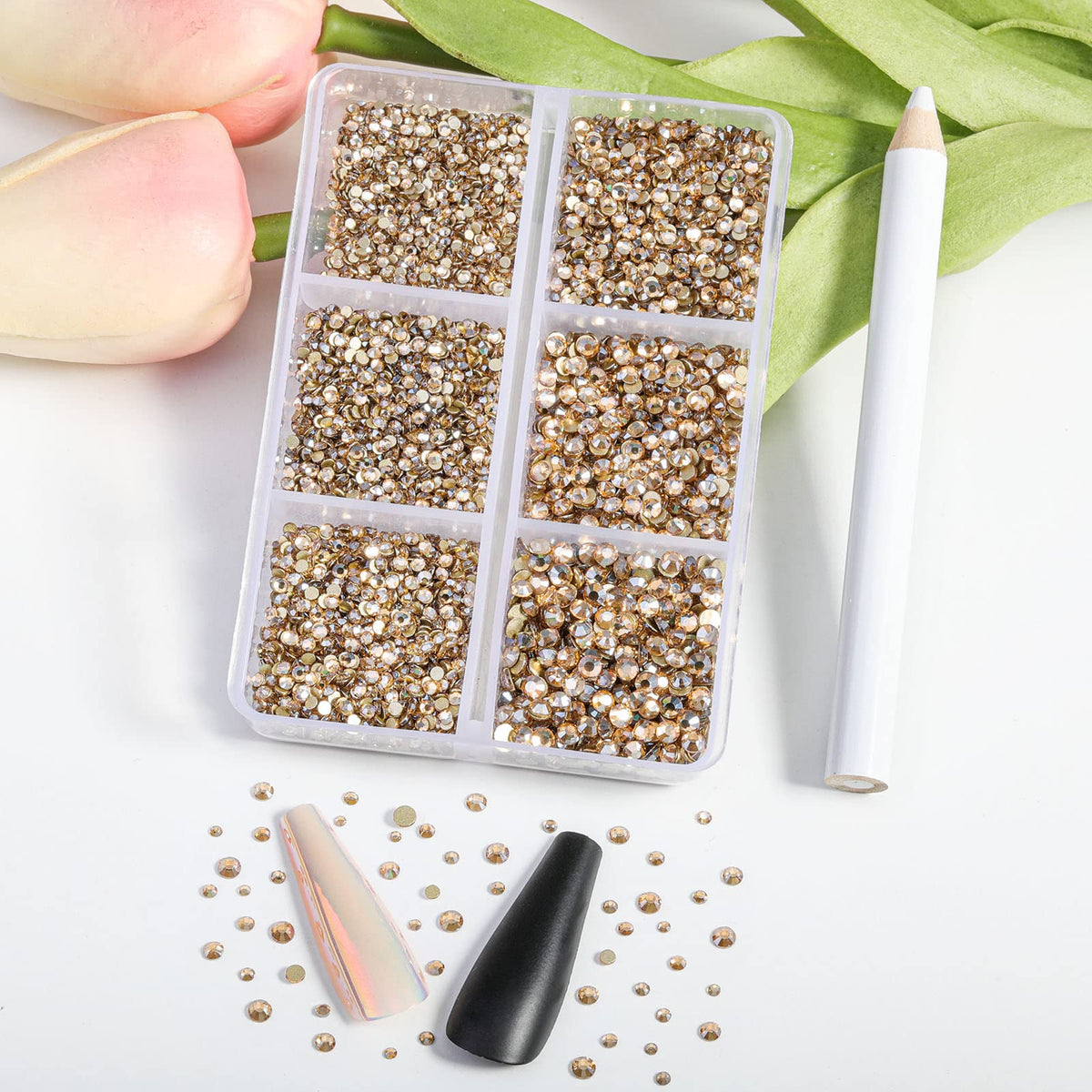 BEADSLAND rhinestones held in hand to show size scale and selection