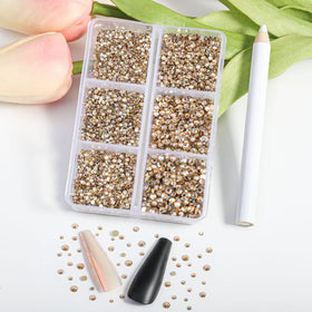 BEADSLAND rhinestones held in hand to show size scale and selection