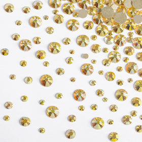 BEADSLAND gold rhinestones applied on nail art highlighting salon-grade finish
