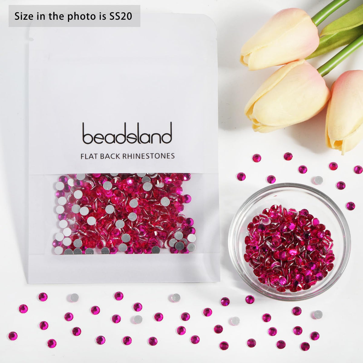 BEADSLAND rhinestones beside a coin showing size and scale for planning