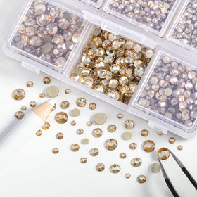 BEADSLAND tweezers and wax pencil next to rhinestones for precise placement benefit