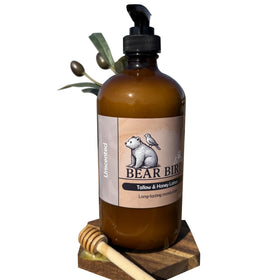 Bear Bird close-up of raw honey and olive oil ingredients, emphasizes nourishing benefits
