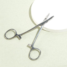 Beautidots tool with sterilization tray and storage pouch illustrating easy cleaning and safe storage