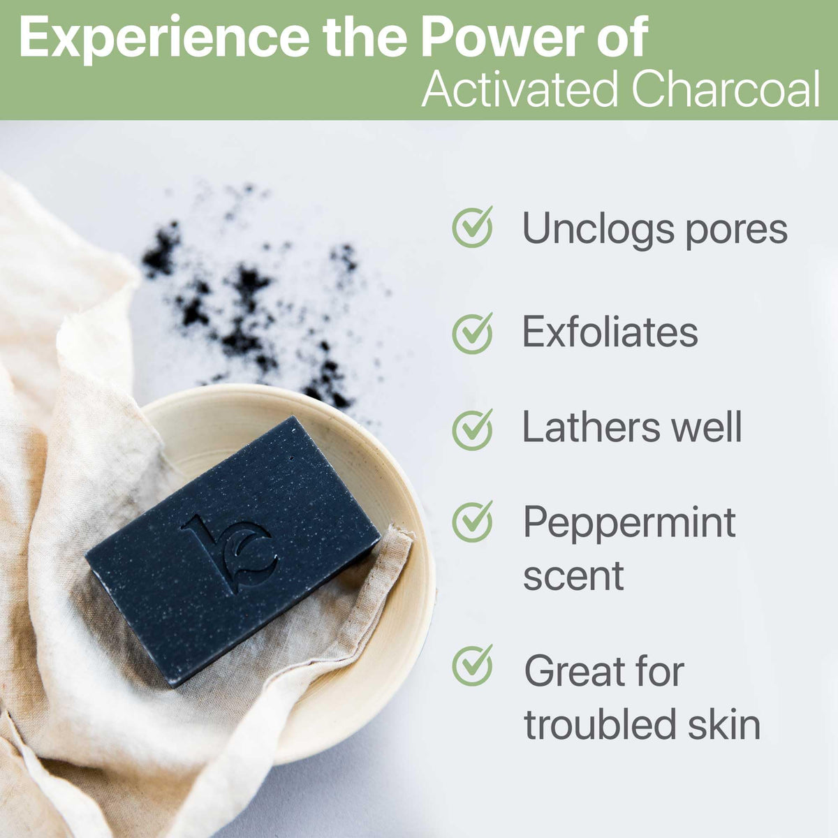 Beauty by Earth close-up texture of charcoal soap highlighting creamy moisturizing feel