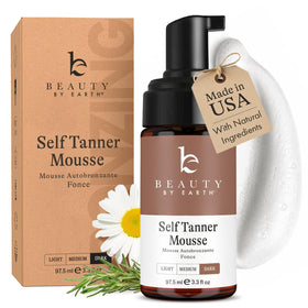 Beauty by Earth front packaging showing clean, dark self tanner mousse benefits