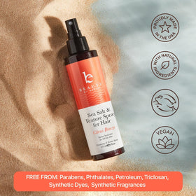 Beauty by Earth bottle in hand showing 6oz scale for travel-friendly use